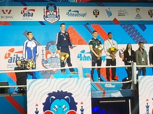 Michael Nevin (2nd from right) on medal podium