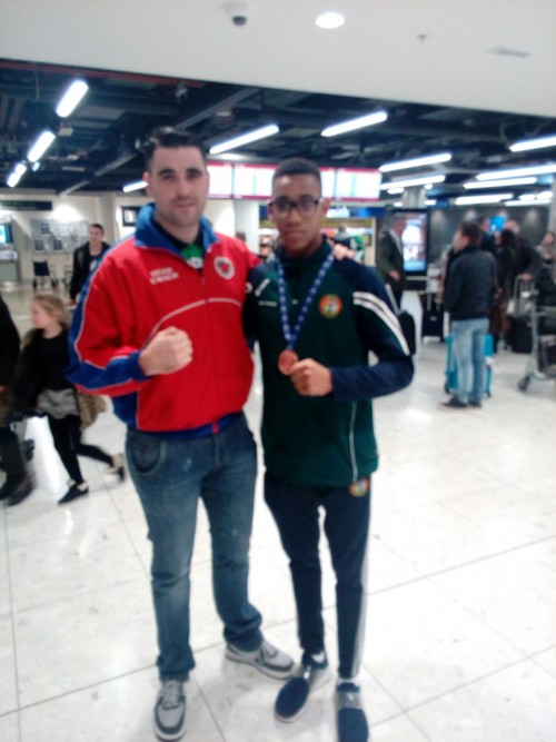 Gabriel Dossen with Olympic BC coach Michael Mongan at Dublin Airport this morning